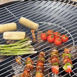 Food on a fire pit grill