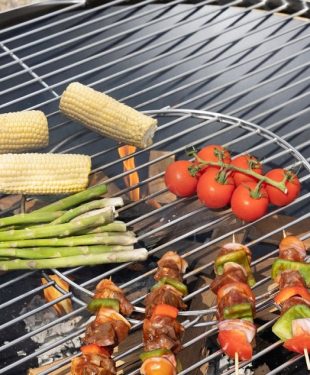 Food on a fire pit grill